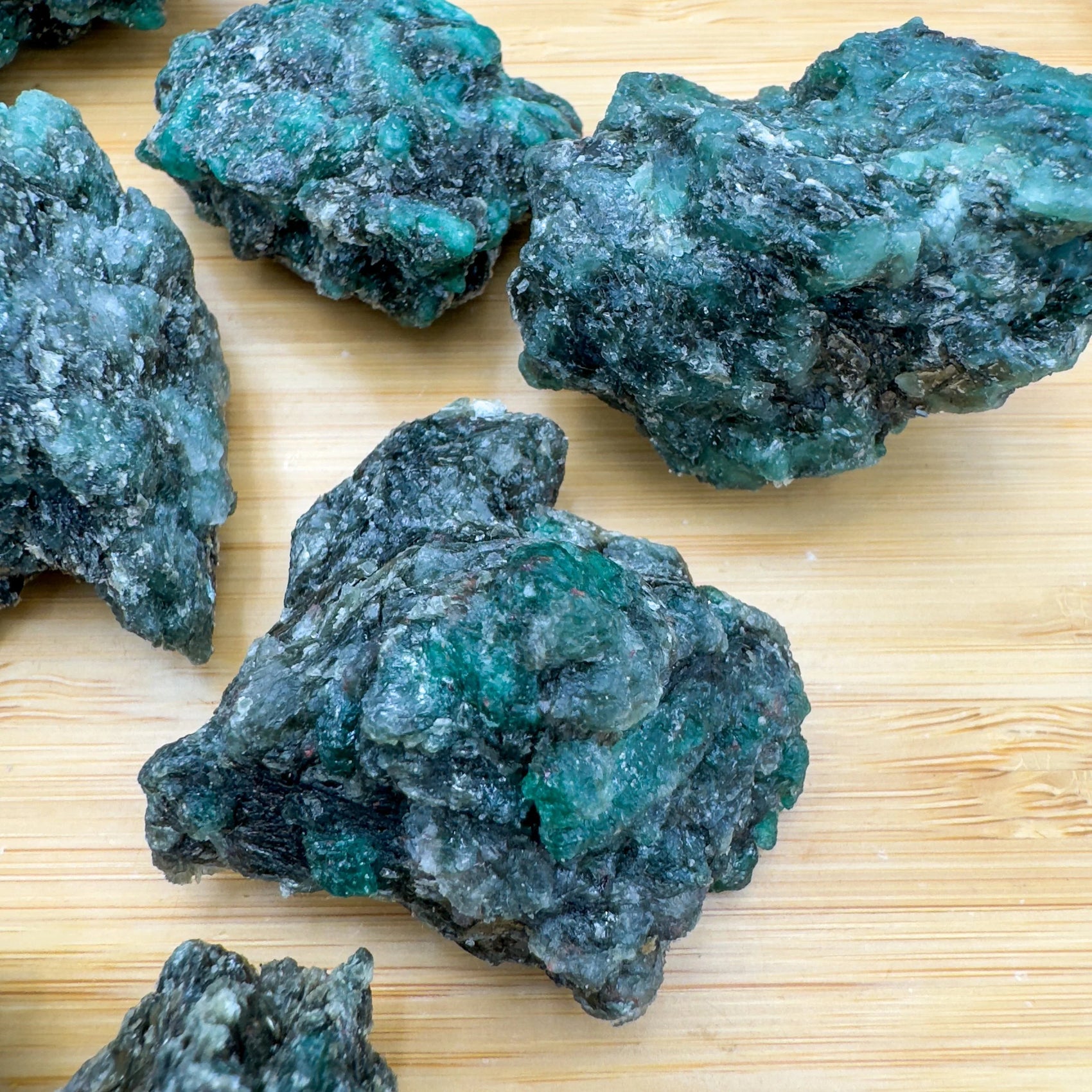 Plan view of Emerald raw stone, carried for Love, showing natural variation.