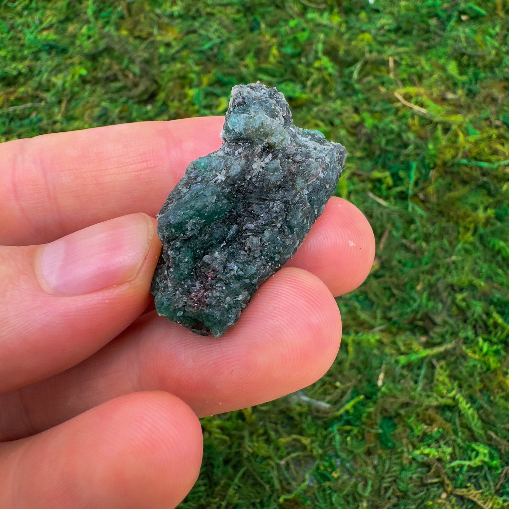 Close-up of Emerald raw stone from Zimbabwe, soothing wellness stone for Healing