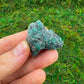 Back view of Grade AA Emerald raw showing natural surface
