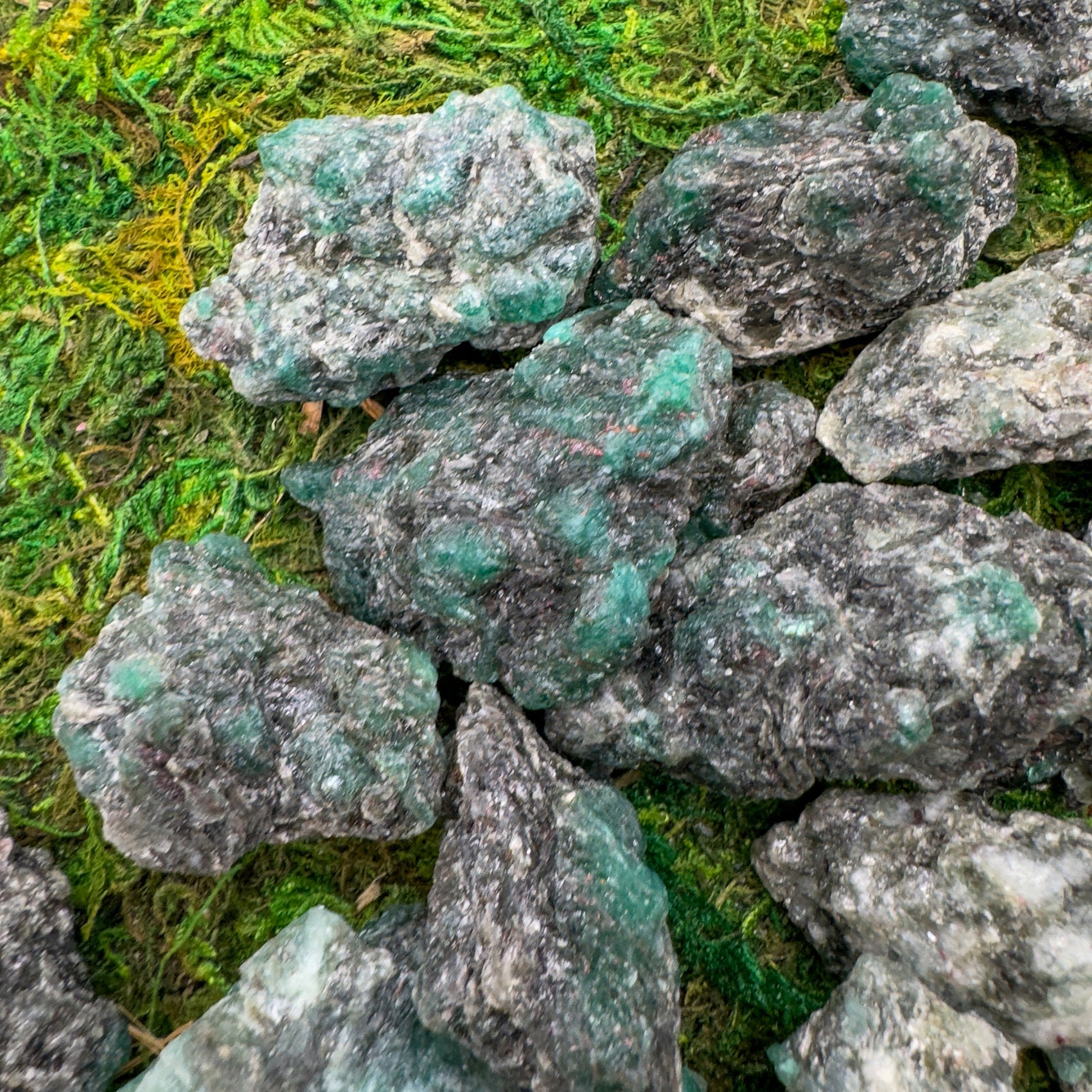 Close-up of Emerald raw stone from Zimbabwe, soothing wellness stone for Healing