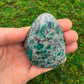 Back view of Grade AA Emerald palm stone showing natural surface