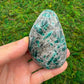 Detail shot of Grade AA Emerald palm stone under natural light