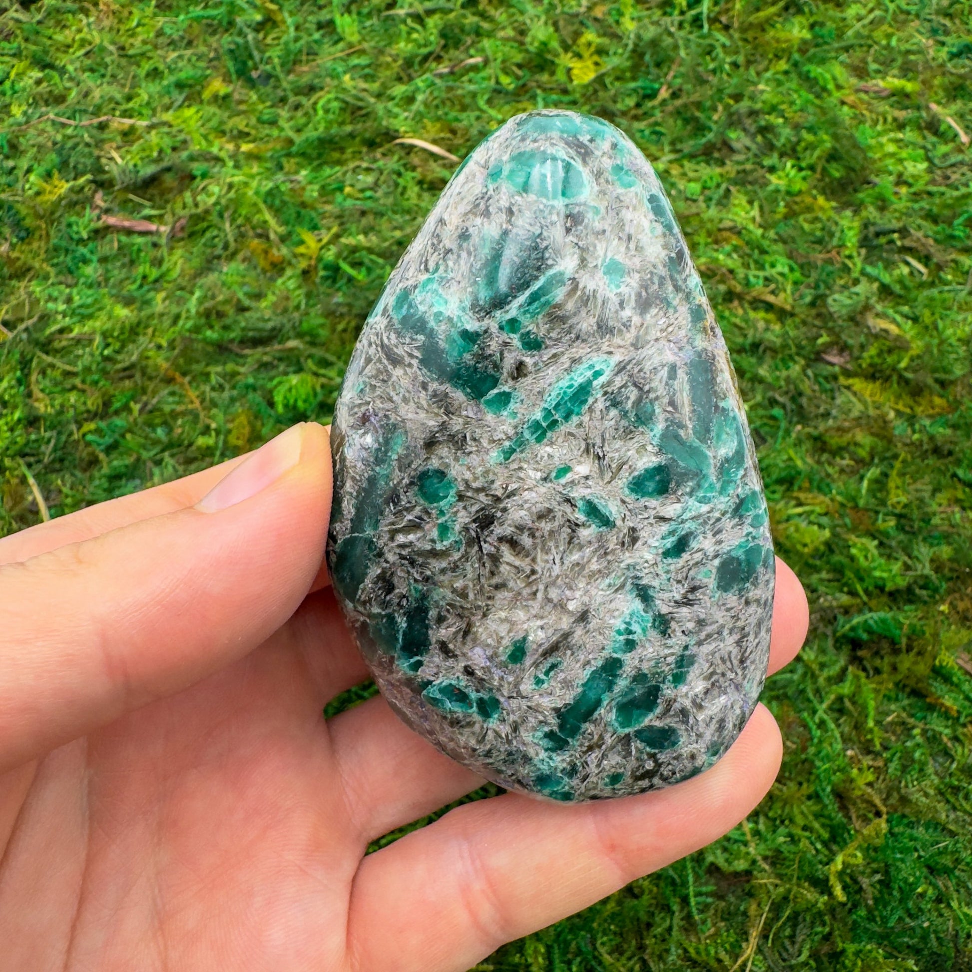 Detail shot of Grade AA Emerald palm stone under natural light