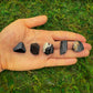Detail shot of Grade AA Black Tourmaline raw under natural light