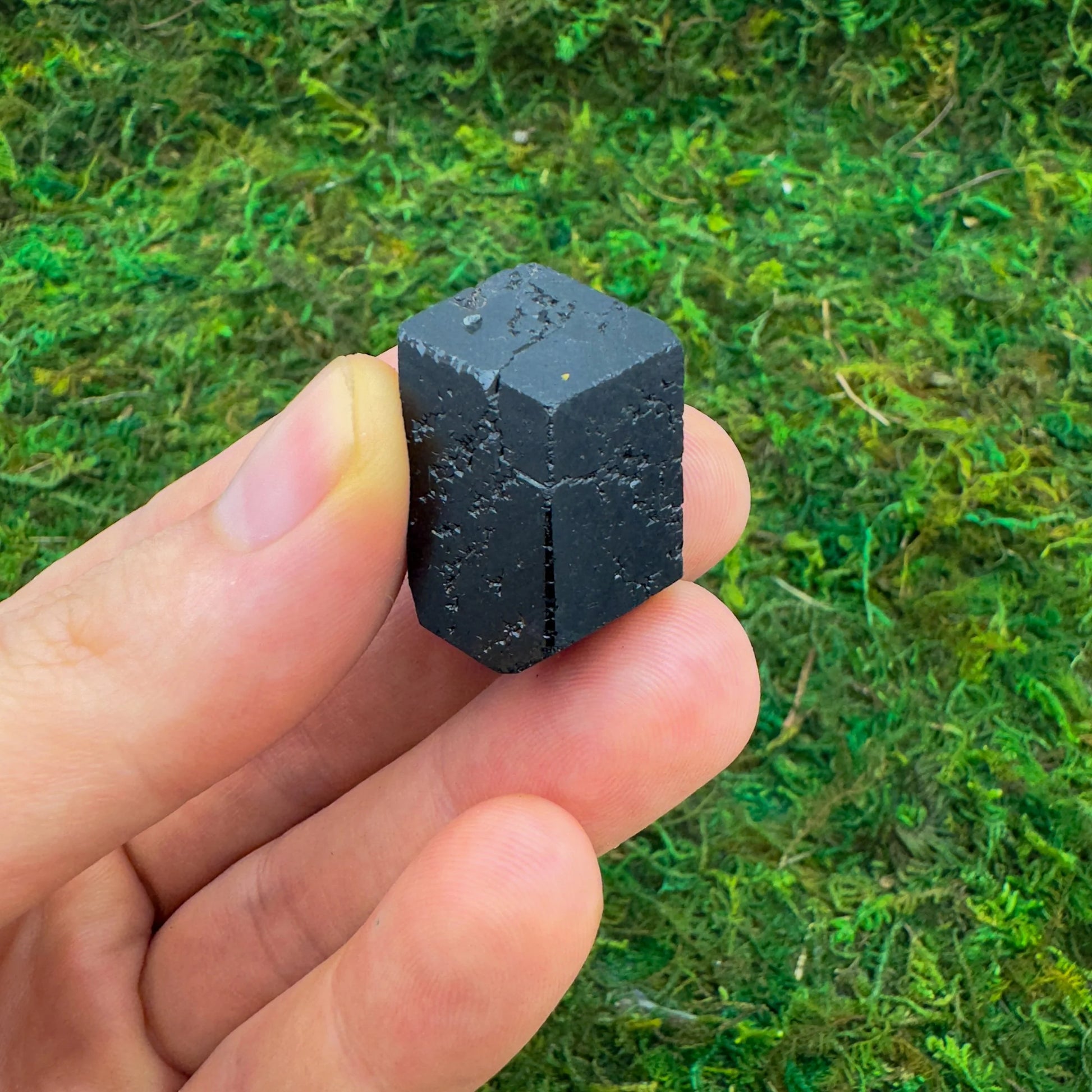 Back view of Grade AA Black Tourmaline raw showing natural surface