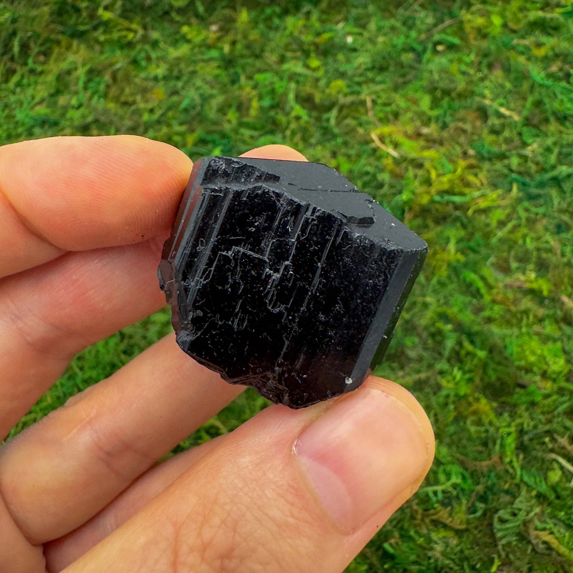 Detail shot of Grade AA Black Tourmaline raw under natural light