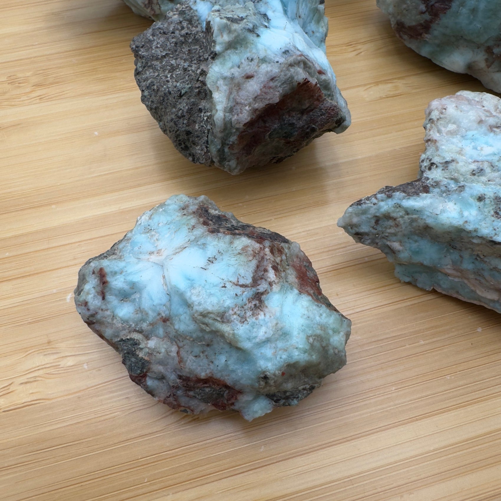 Detail shot of Grade A Larimar raw under natural light
