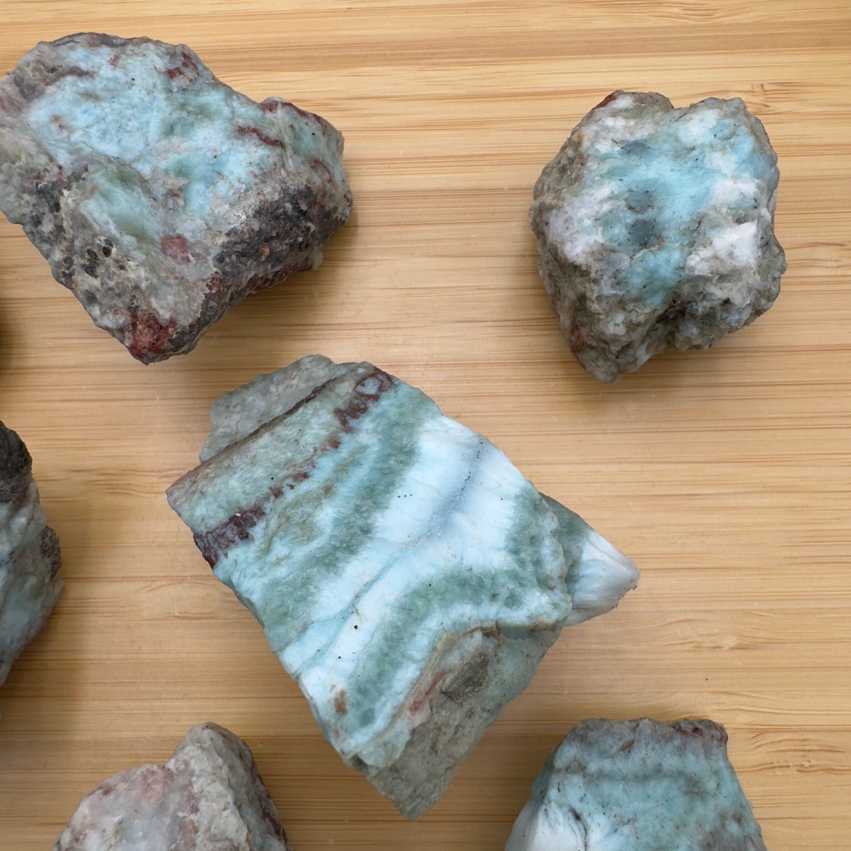 Back view of Grade A Larimar raw showing natural surface