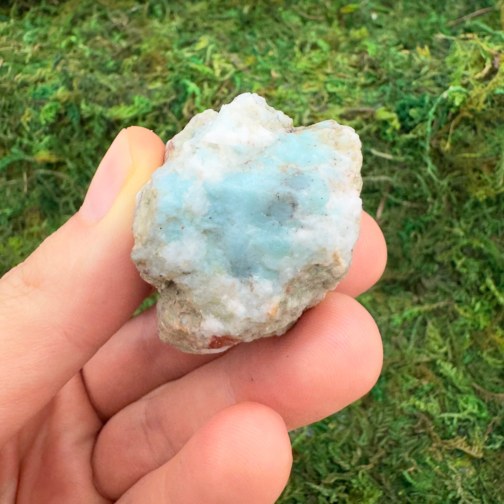 Profile shot of Larimar raw stone, hand-selected from Barahona Province, Dominican Republic, showing natural form.