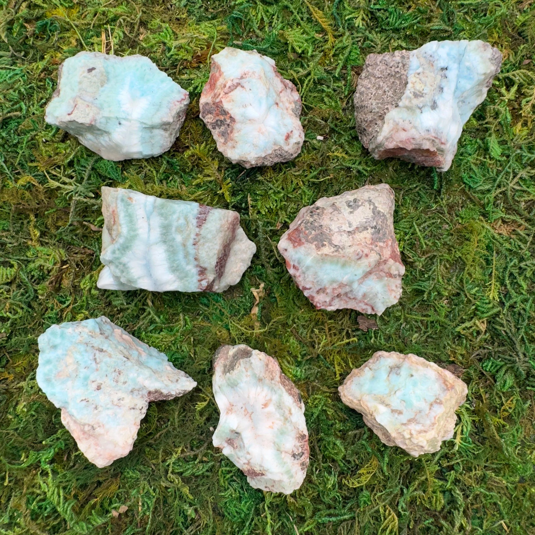Up-close view of Larimar raw stone, showing open form, hand-selected from Barahona Province, Dominican Republic.