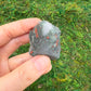 Back view of Grade AA Bloodstone raw showing natural surface