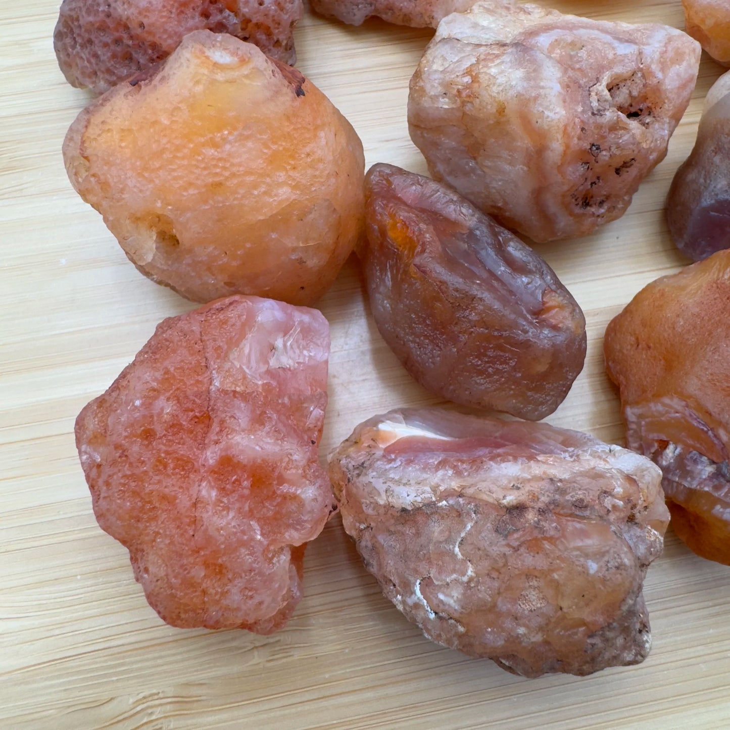Profile view of Carnelian raw stone, kept near for Energy and Confidence.