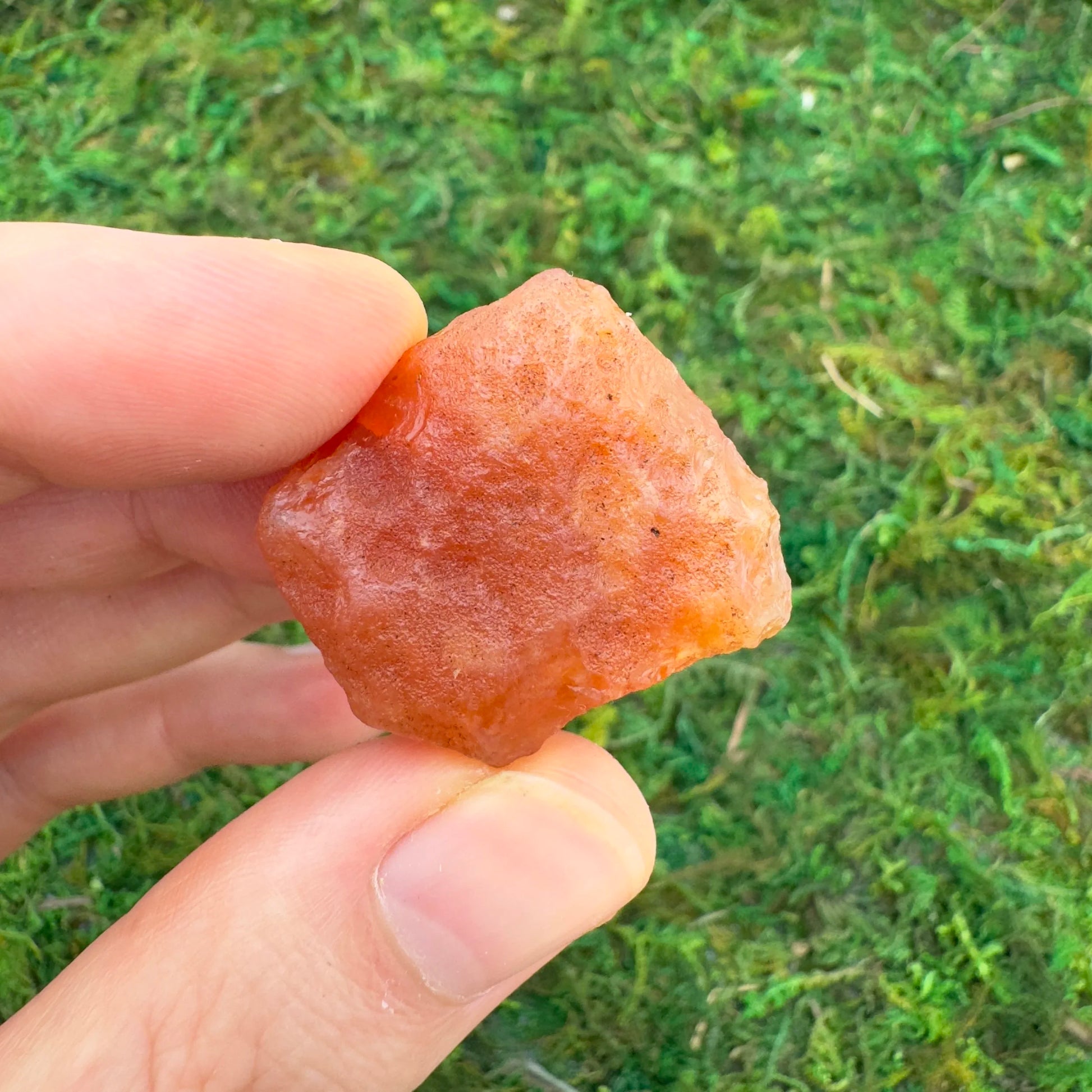 Back view of Grade A Carnelian raw showing natural surface