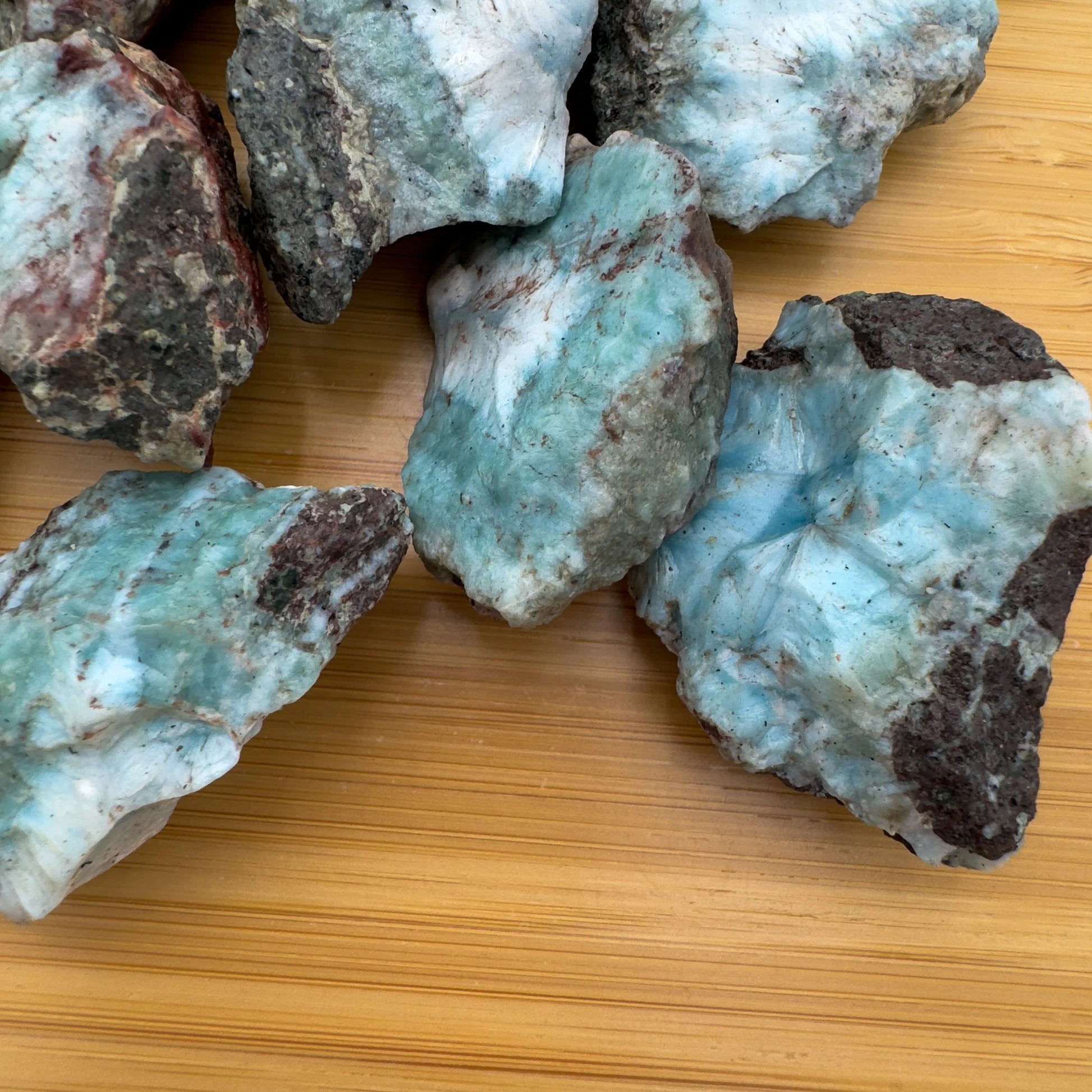 Close-up of Larimar raw stone from Dominican Republic, soothing wellness stone for Emotional Healing