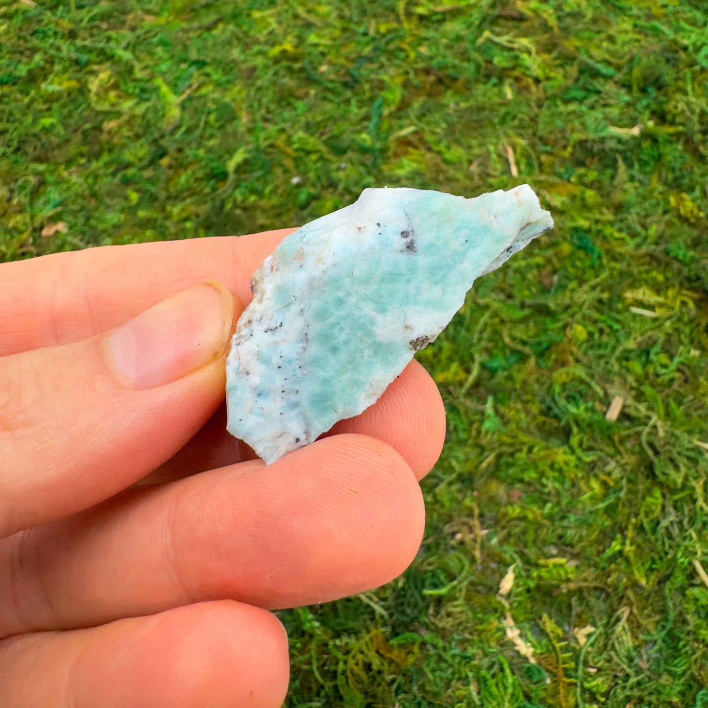 Close-up of Larimar raw stone from Dominican Republic, soothing wellness stone for Emotional Healing