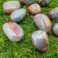 Full profile of Grade AA Red Agate tumbled stone ready to ship from Beyond Bohemian