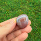 Full profile of Grade AA Red Agate tumbled stone ready to ship from Beyond Bohemian