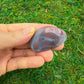 Full profile of Grade AA Red Agate tumbled stone ready to ship from Beyond Bohemian