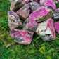 Wider context of Cobalt Calcite raw crystal, from Haut-Lomami, Democratic Republic of the Congo, associated with Emotional Healing, set to give a sense of weight.