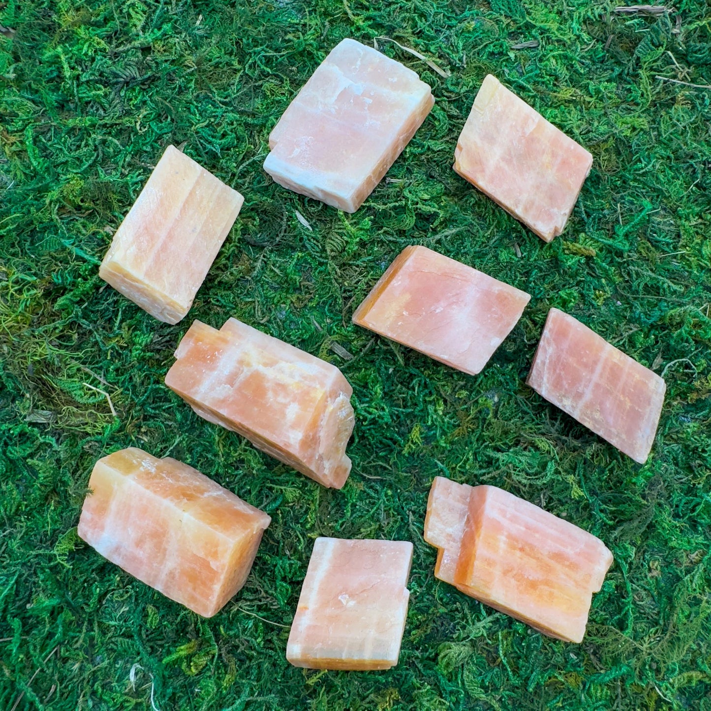 Detail shot of Grade AA Orange Calcite raw under natural light