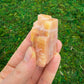 Full profile of Grade AA Orange Calcite raw ready to ship from Beyond Bohemian