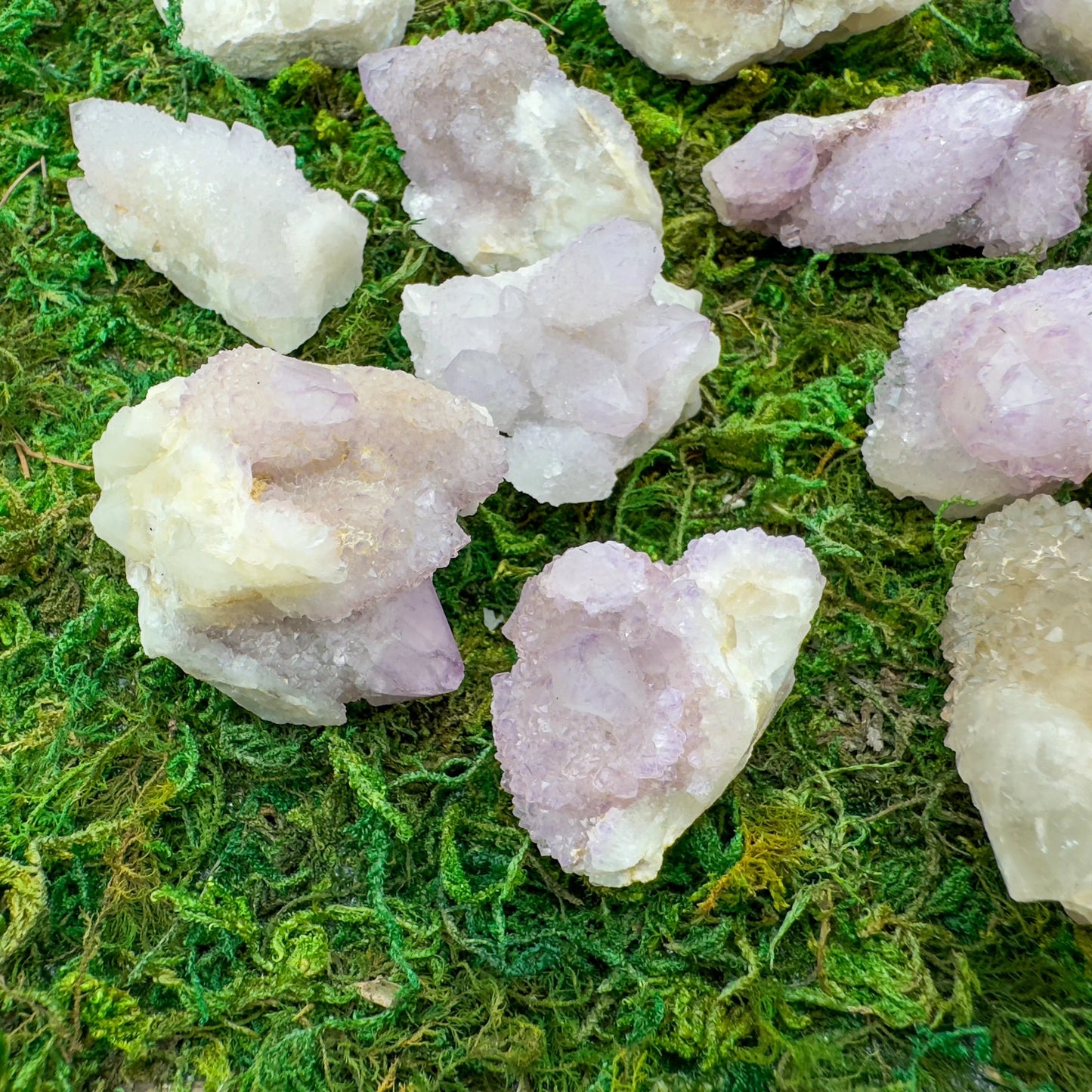 Grade aa quartz raw held in hand for size reference