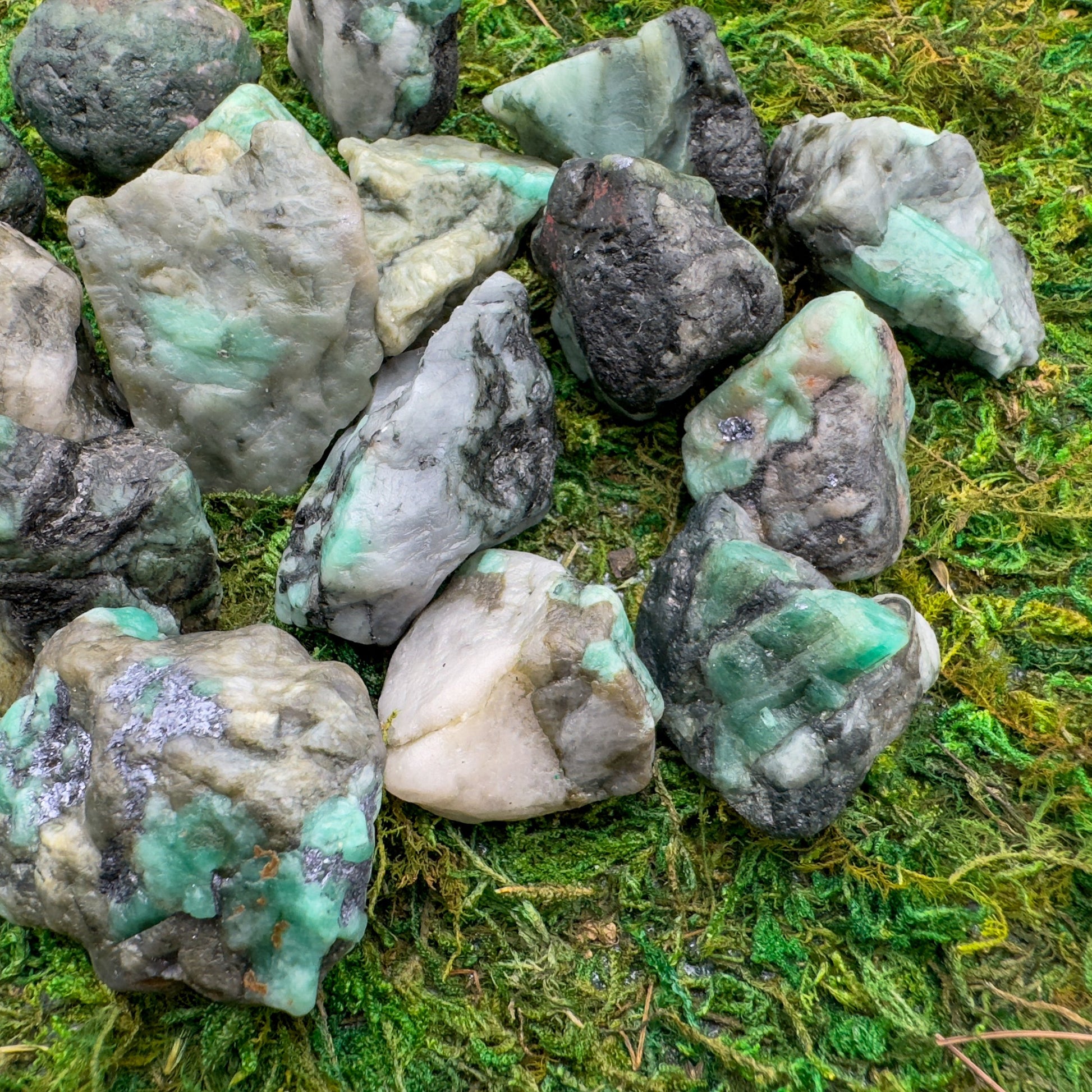 Back view of Grade AA Emerald raw showing natural surface