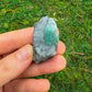 Detail shot of Grade AA Emerald raw under natural light
