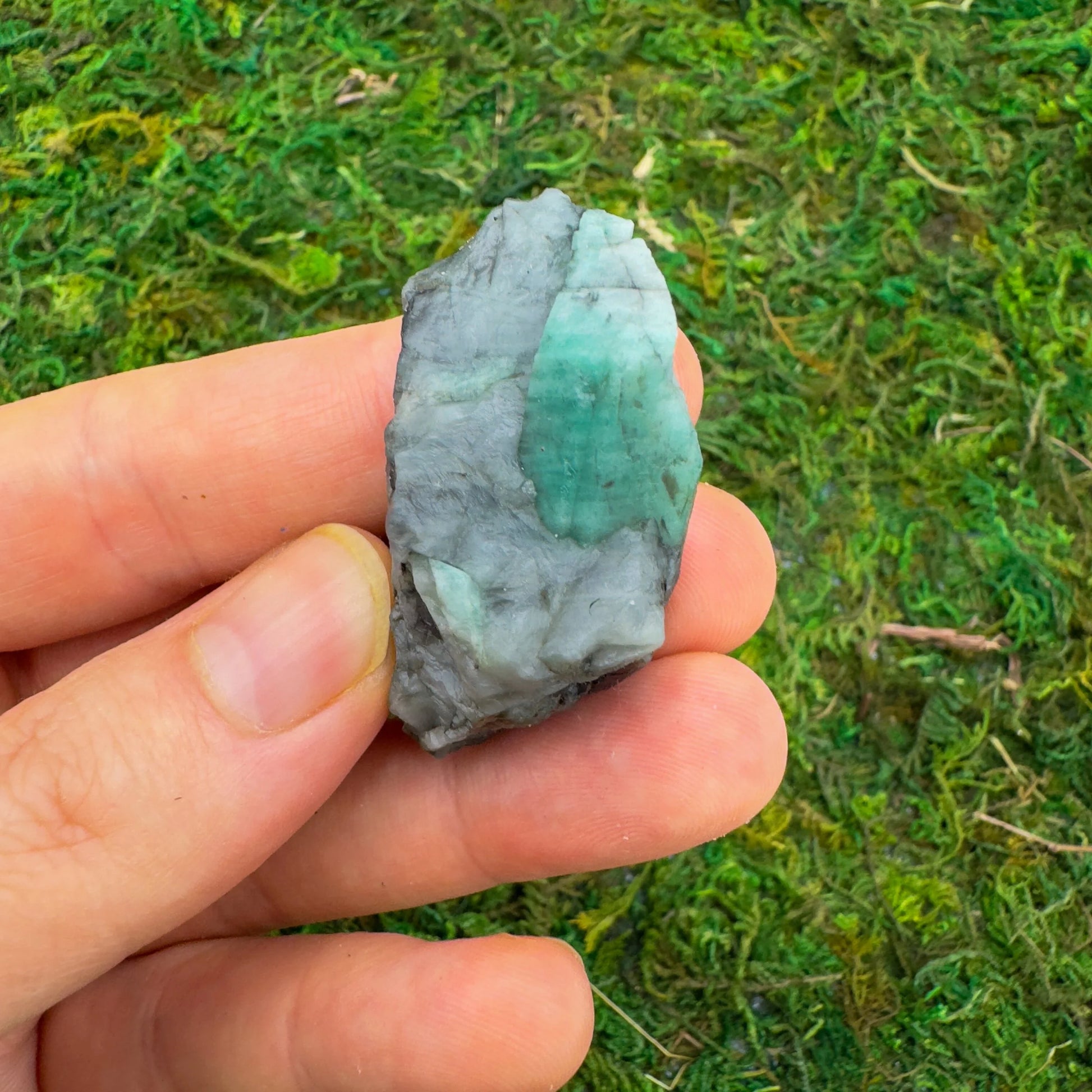 Detail shot of Grade AA Emerald raw under natural light
