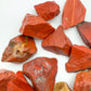 Reverse side of Red Jasper raw stone, traditionally used for Grounding and Energy, showing characteristic finish.