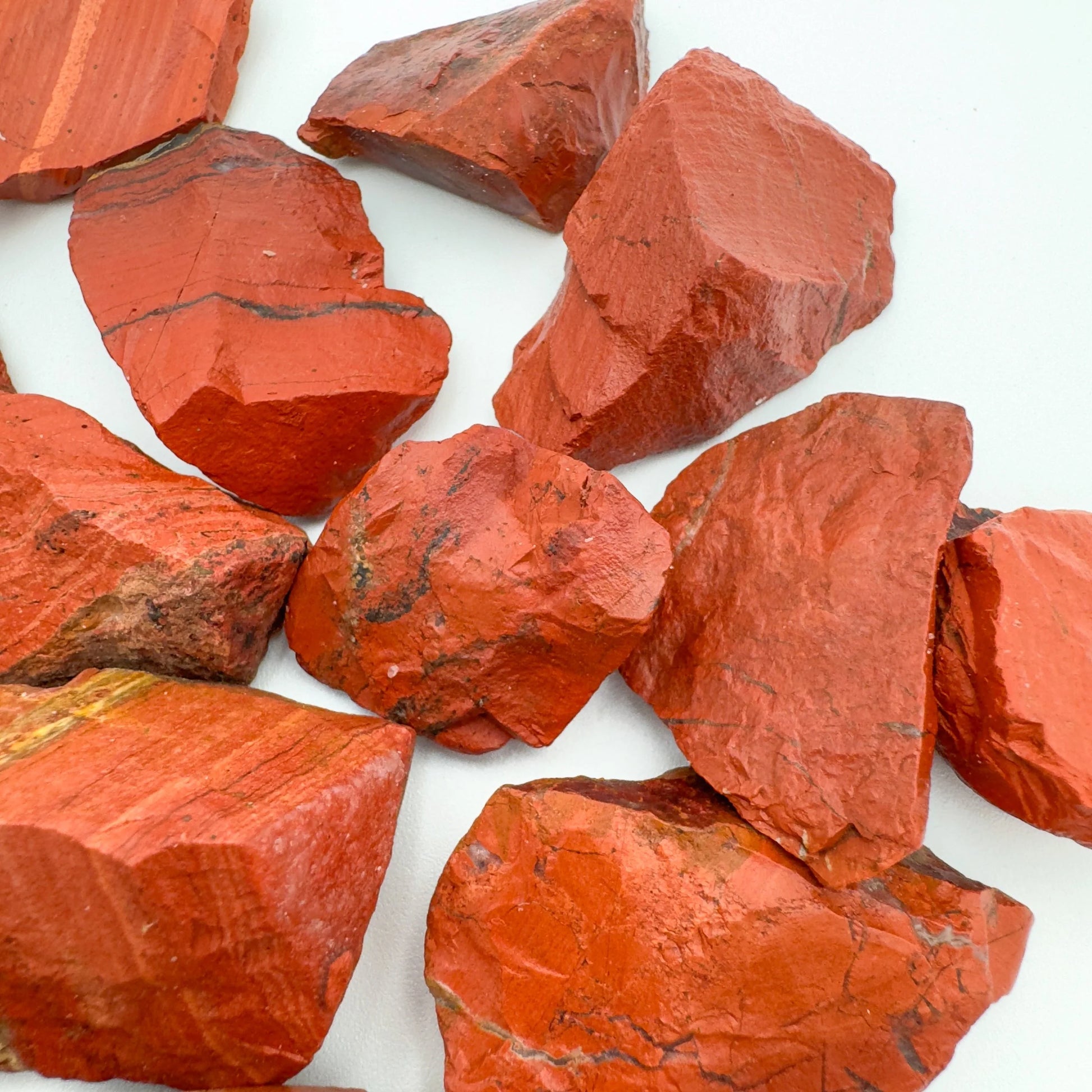 Size comparison with a Red Jasper raw stone, from South Africa.
