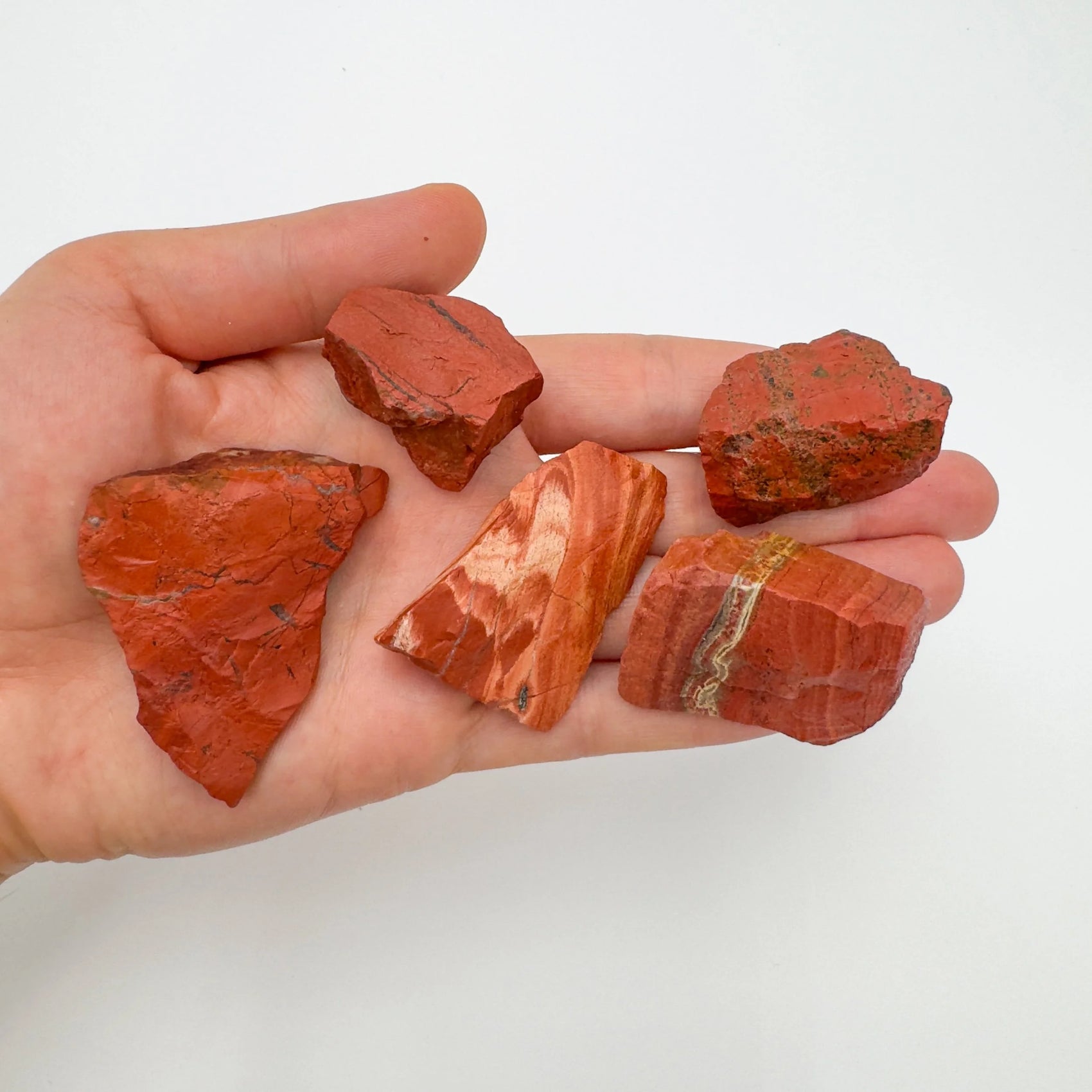 Back view of Grade AA Red Jasper raw showing natural surface
