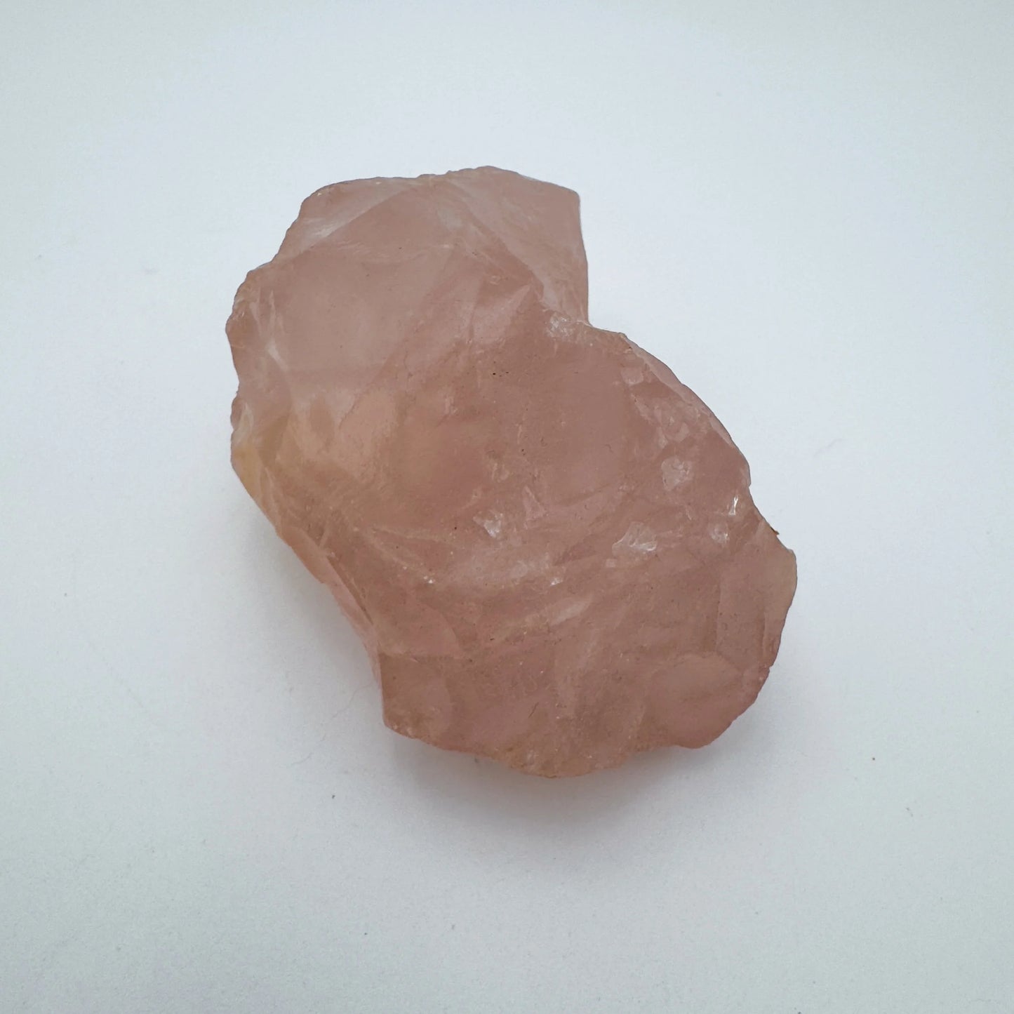 Underside detail of pink Rose Quartz specimen, sourced from Alaotra-Mangoro, Madagascar.