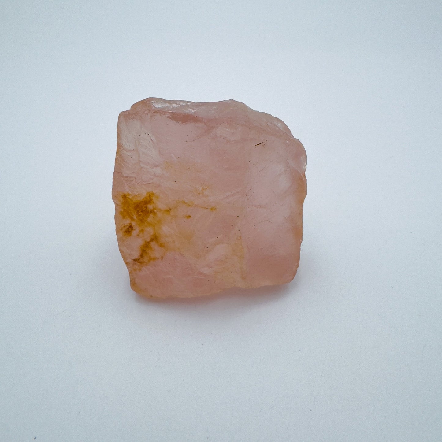 Close-up of Rose Quartz specimen, kept close for Love and Self Love, showing subtle veining.
