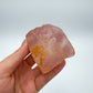 Back view of Grade AA Rose Quartz specimen showing natural surface