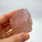 Back view of Grade AAA Rose Quartz specimen showing natural surface