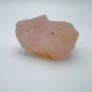 Edge-on view of Rose Quartz specimen, showing natural color depth.