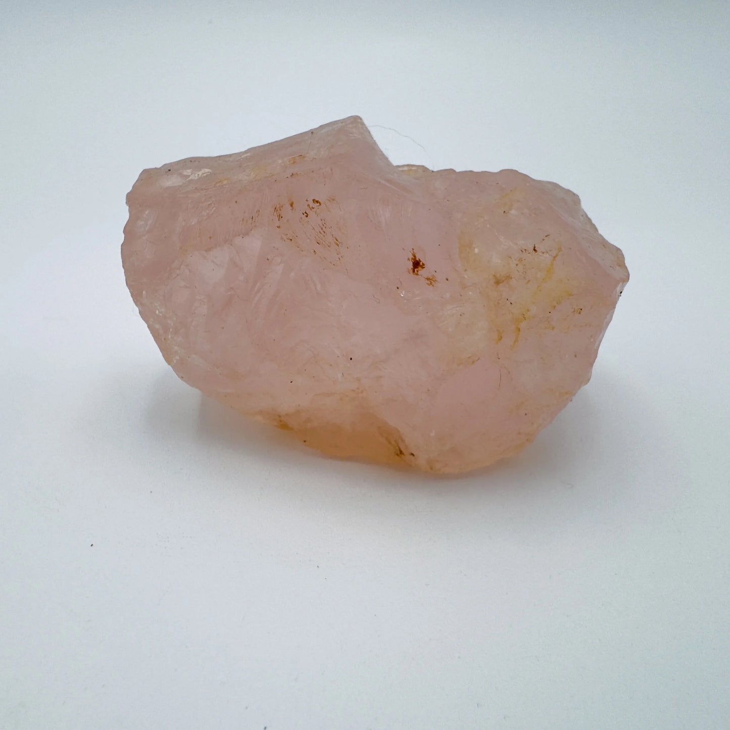 Edge-on view of Rose Quartz specimen, showing natural color depth.