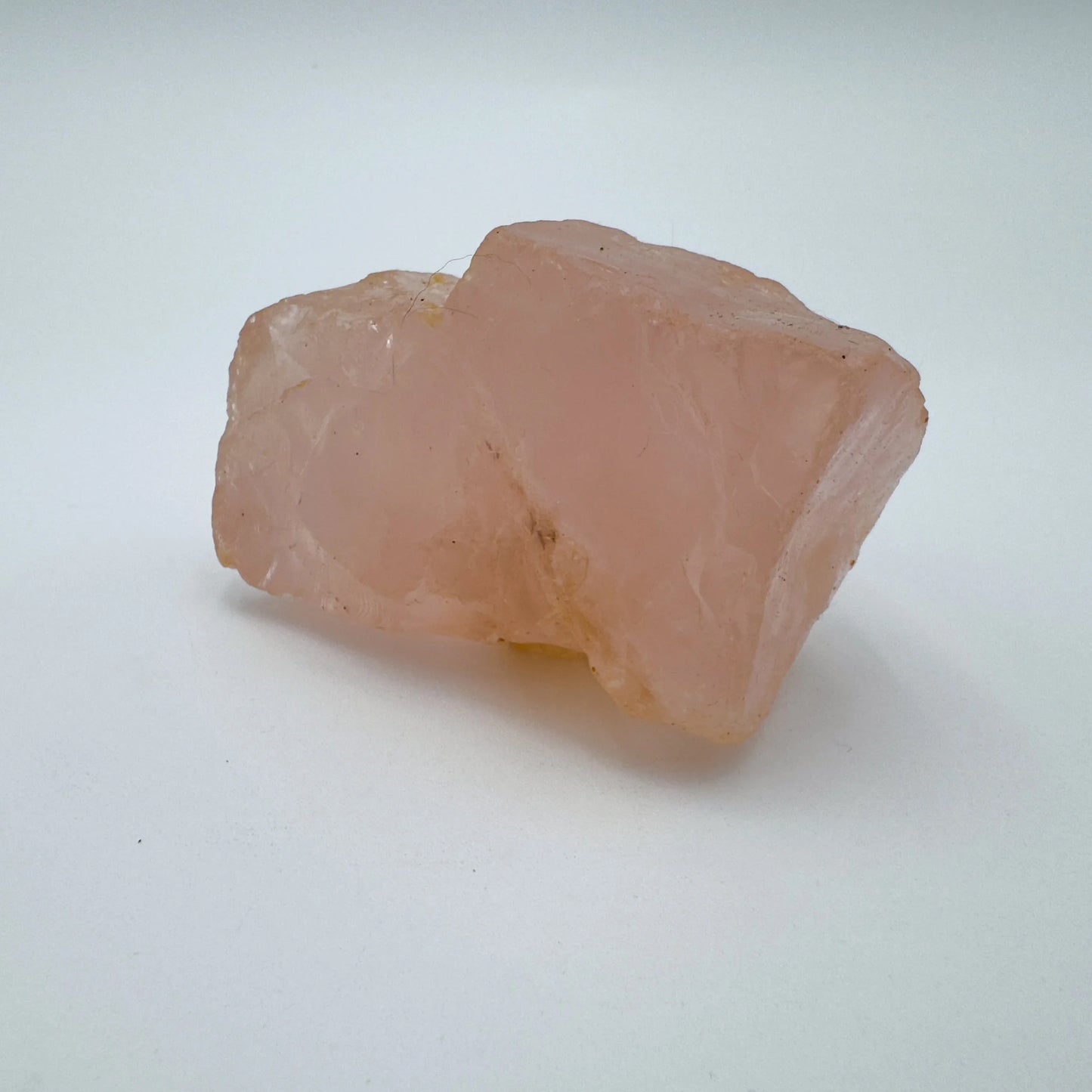 Alternate side of Rose Quartz specimen, showing subtle veining, kept close for Love.