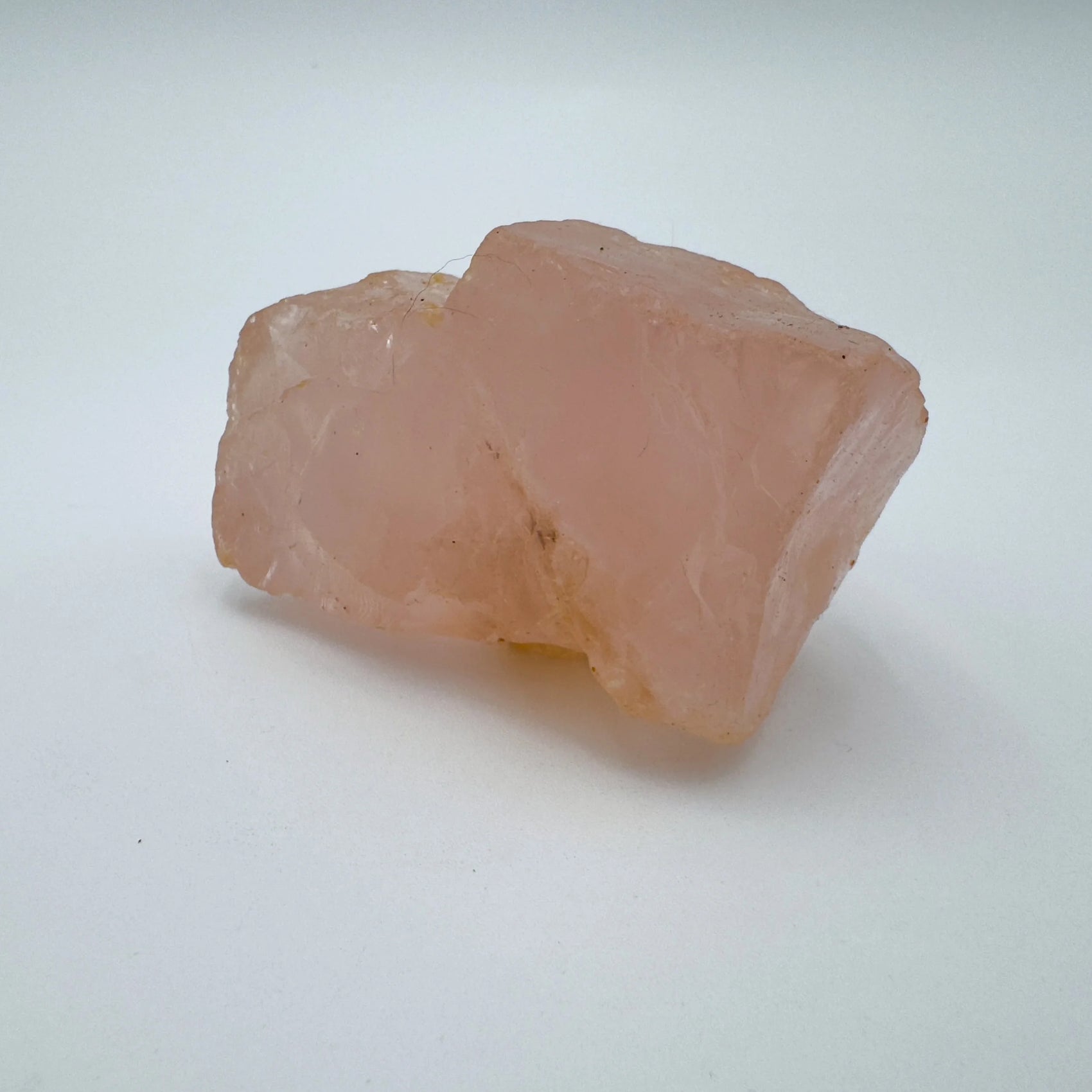 Alternate side of Rose Quartz specimen, showing subtle veining, kept close for Love.