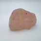 Back view of Grade AAA Rose Quartz specimen showing natural surface