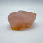Scale reference of a single Rose Quartz specimen sourced from Madagascar.