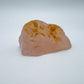 Scale comparison of Rose Quartz specimen, in the warmth of daylight.