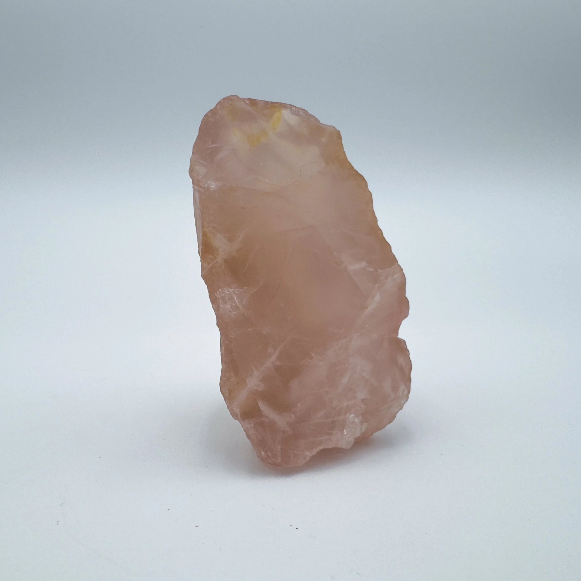 Back view of Grade AAA Rose Quartz specimen showing natural surface