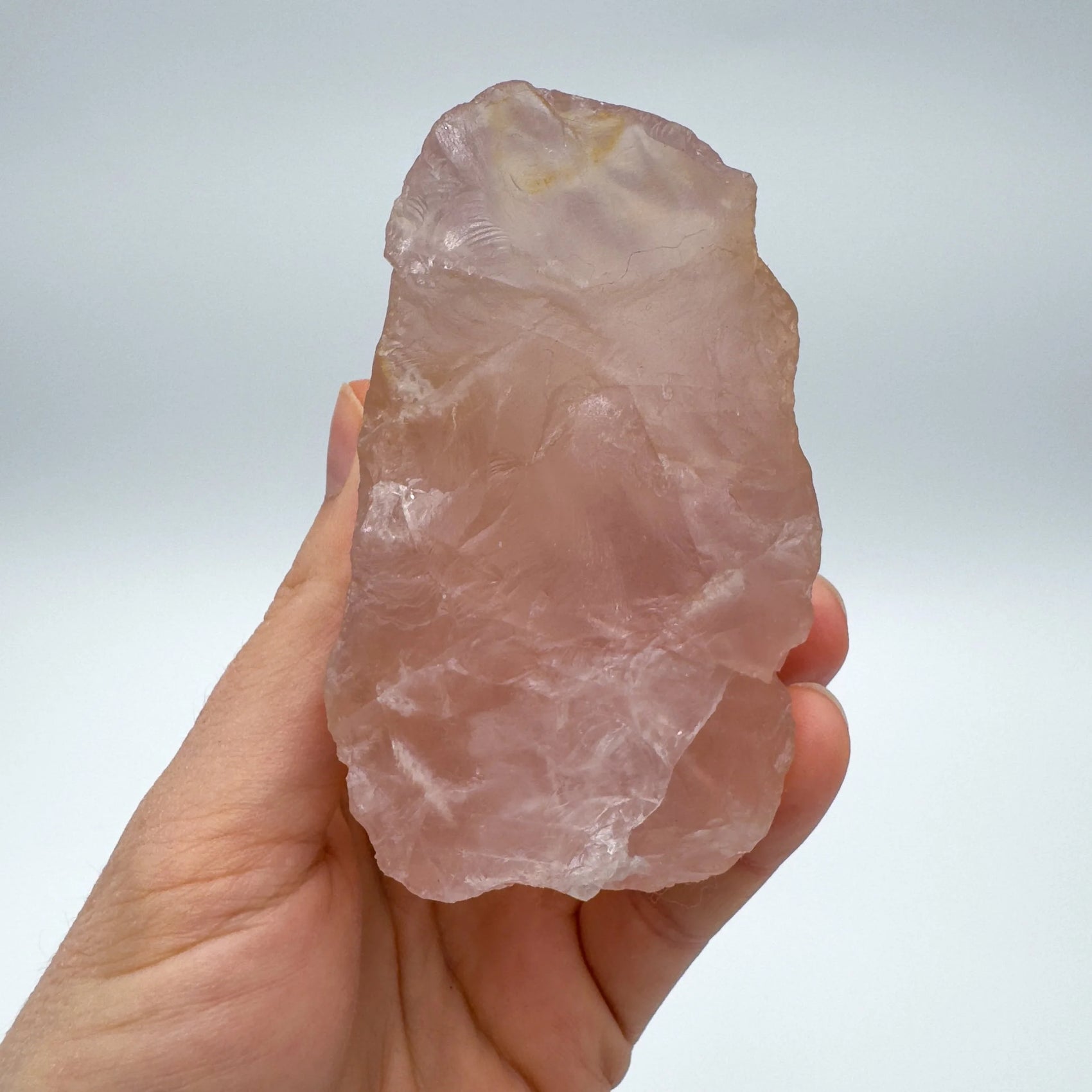 Detail shot of Grade AAA Rose Quartz specimen under natural light