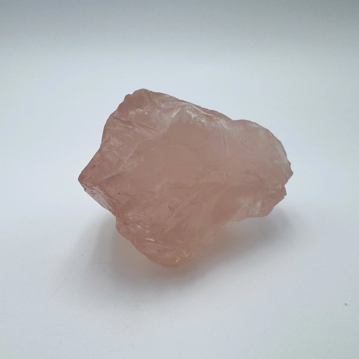 Natural surface of Rose Quartz specimen, drawn on for Love, sourced from Madagascar.