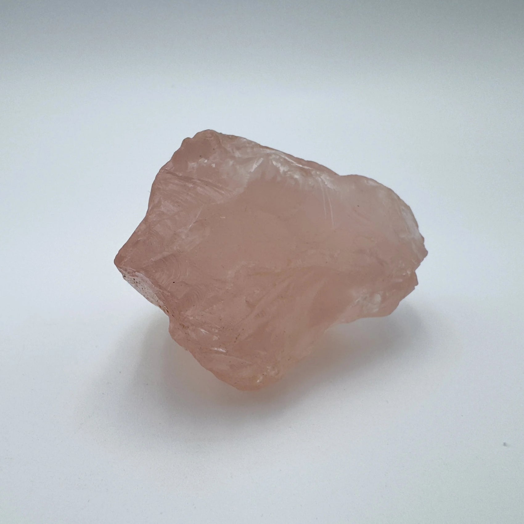 Natural surface of Rose Quartz specimen, drawn on for Love, sourced from Madagascar.
