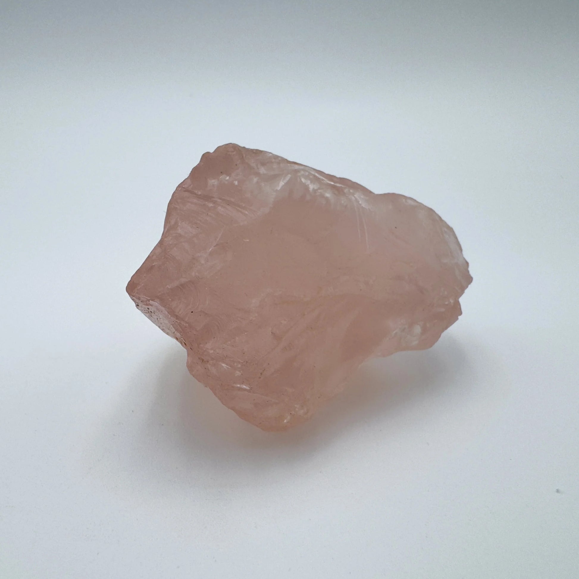 Natural surface of Rose Quartz specimen, drawn on for Love, sourced from Madagascar.
