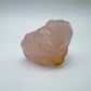 Held in hand, a Rose Quartz specimen to support Love.