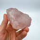 Detail shot of Grade AAA Rose Quartz specimen under natural light